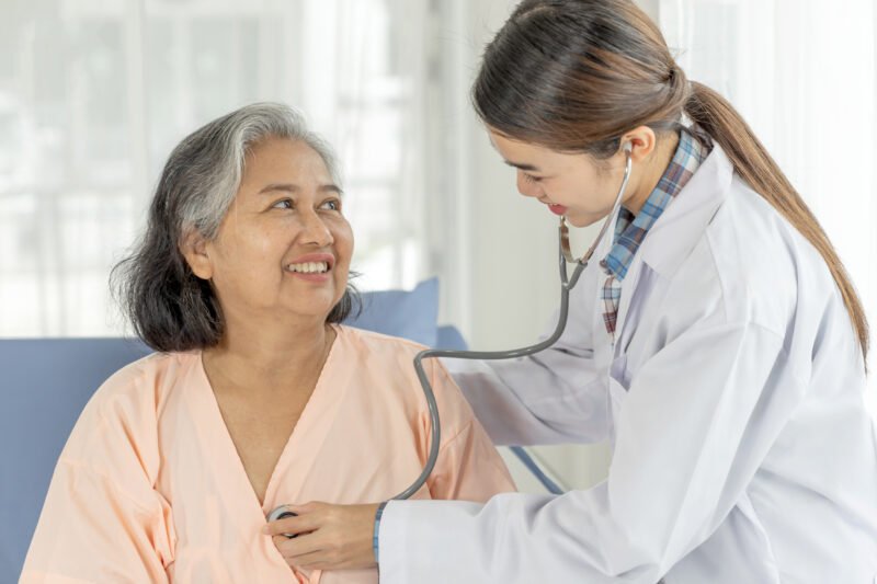 doctor-examining-senior-elderly-female-patient-hospital-bed-patients-medical-healthcare-senior-concept doctor-examining-senior-elderly-female-patient-hospital-bed-patients-medical-healthcare-senior-concept