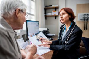 elderly patient meeting doctor hospital