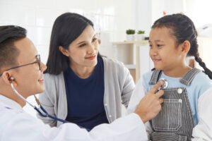 mother daughter come doctor