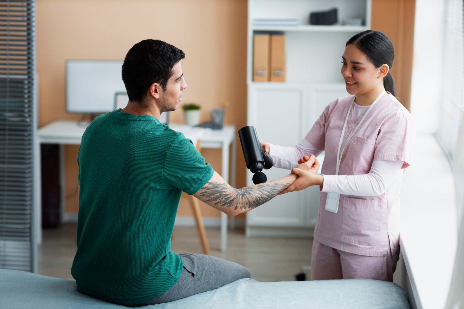 doctor helping patient rehabilitation 1 scaled