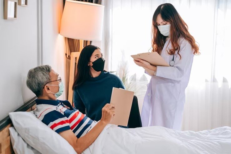 imgi 11 asian doctor visit examines senior man home doctor checking up consulting retirement health partienthospital services wearing mask protect covid19 6